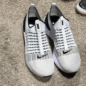 Nike Men’s White and Black Knit Slip-On Sneakers